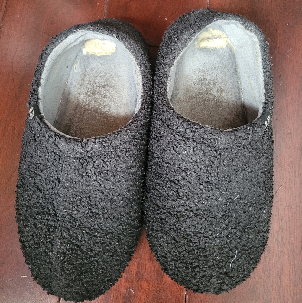 Well Worn Black Slippers